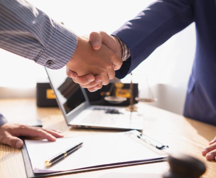 Businessmen,And,Investors,Discussed,Joint,Venture,Within,The,Legal,Counsel